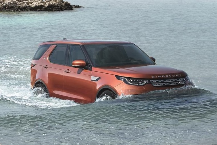 Land Rover Discovery wading in water