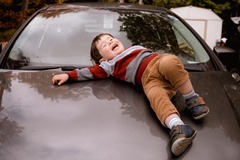 Parents spend FOUR DAYS a year getting their kids into the car