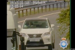 Roy &lsquo;Chubby&rsquo; Brown caught reading The Sun while driving