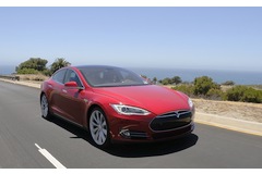 Tesla opens first UK store while CEO Musk hints at future models