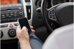 Severe drop in penalty points for motorists using phone illegally