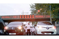 Electric cars race round London on giant Scalextric track